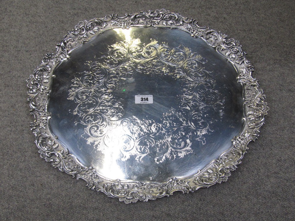 Appraisal: Circular silver plated tray with Rococo decoration