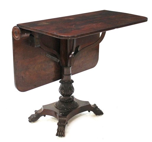 Appraisal: A Regency mahogany drop flap table on carved column and