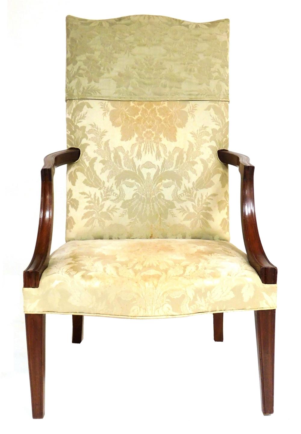 Appraisal: Lolling chair American late th C faded green upholstery serpentine