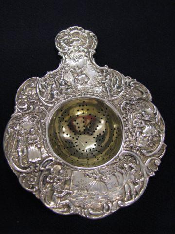 Appraisal: Dutch Sterling Silver Tea Strainer elaborate courting scenes th century