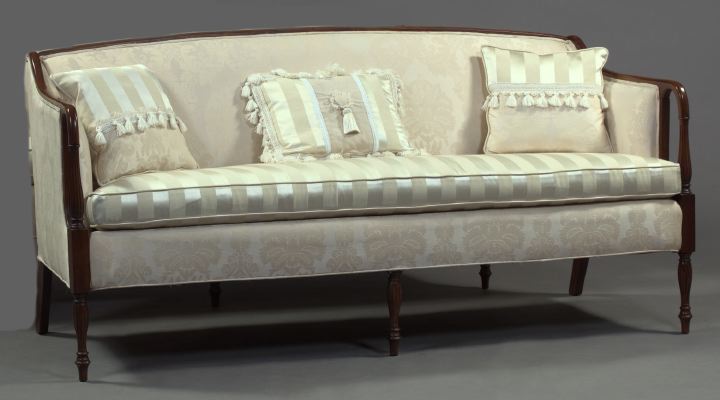 Appraisal: Sheraton-Style Stained Mahogany Sofa with down-curved open arms supported by