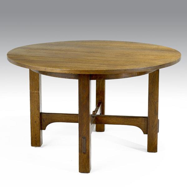 Appraisal: GUSTAV STICKLEYLibrary table with curved stretchersUnmarked x dia