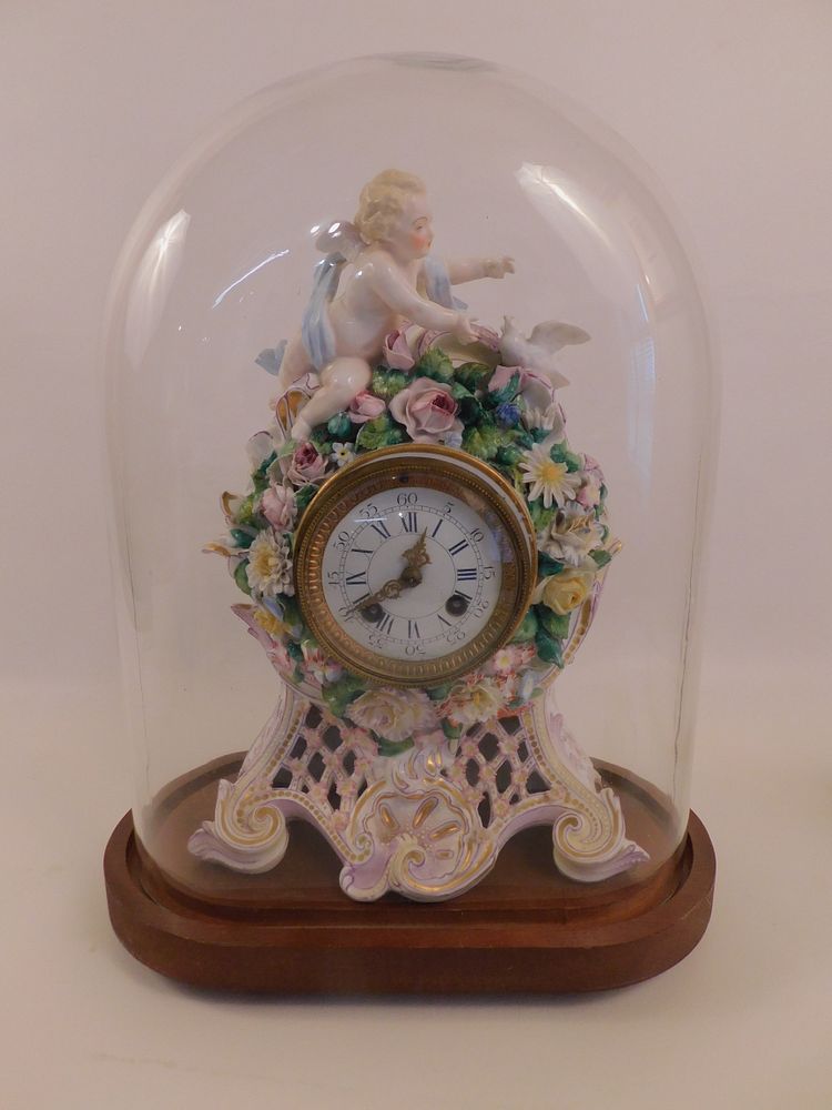 Appraisal: ANTIQUE PORCELAIN CHERUB CLOCK DOME th century rococo French porcelain