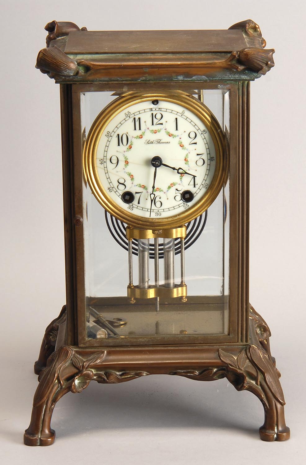 Appraisal: SETH THOMAS BRASS SHELF CLOCK with molded floral design at