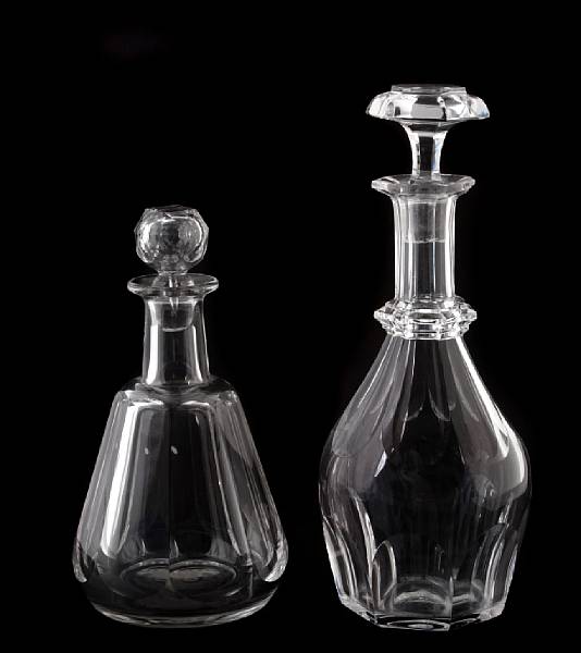 Appraisal: Two Baccarat crystal decanters together with another decanter chips height