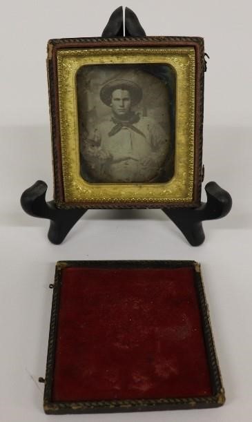 Appraisal: Daguerreotype of a seated cowboy th c x sight size