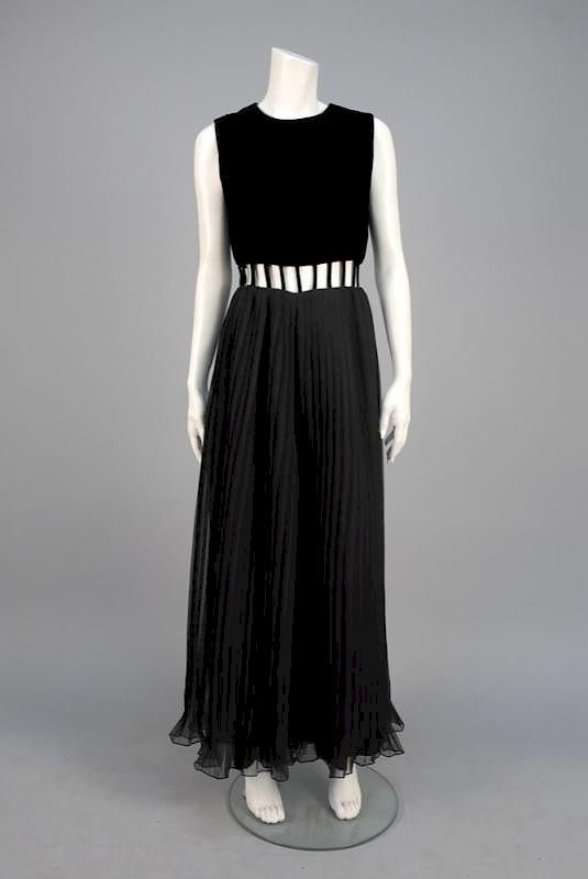 Appraisal: EVENING JUMPSUIT with CUT-OUT BODICE s Sleeveless black velvet bodice