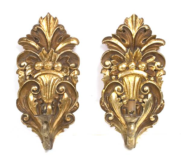 Appraisal: A pair of Italian Rococo style gilt wood sconces height