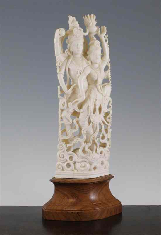 Appraisal: A large Indian ivory group of Shiva and Parvati second