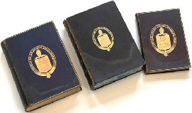 Appraisal: THREE LEATHER BOUND BOOKS EMBOSSED WITH MELBOURNE GRAMMER EMBLEM