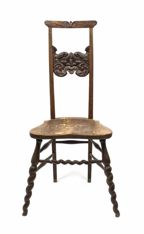 Appraisal: A Gothic Revival Oak Side Chair having a figural splat