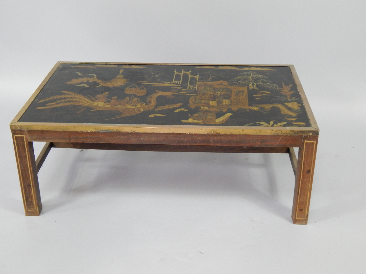 Appraisal: An chinoiserie ebony and brass mounted rectangular occasional table set