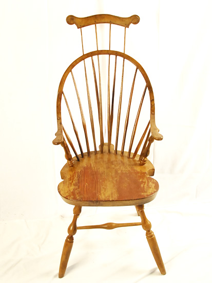 Appraisal: A Continuous-arm Braced and Comb Back Windsor New England with