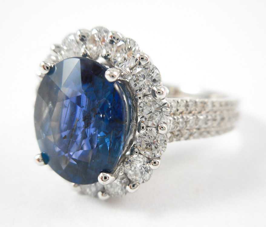 Appraisal: COLOR CHANGE SAPPHIRE AND DIAMOND RING with AIGS Gem I