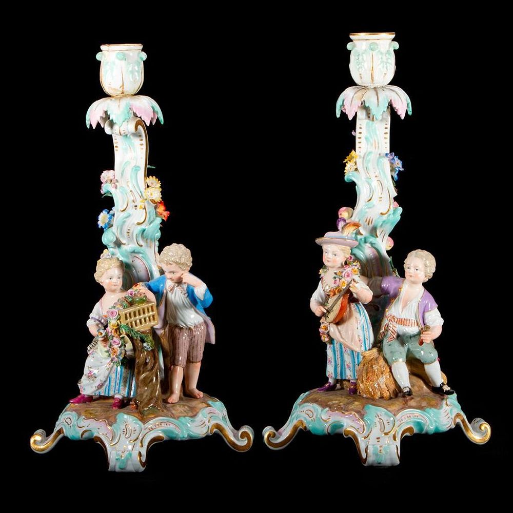 Appraisal: A pair of Meissen candlesticks A pair of Meissen porcelain