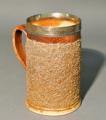 Appraisal: - Earthenware tankard with hallmarked silver banded rim monogrammed N