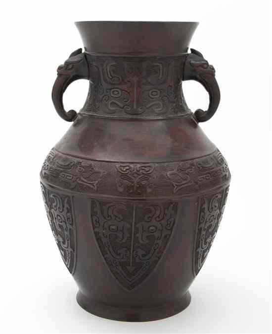 Appraisal: A Chinese Bronze Vase of baluster form having taotie decoration