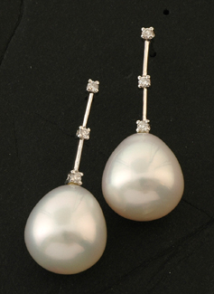 Appraisal: A pair of South Sea pearl and diamond earrings Each