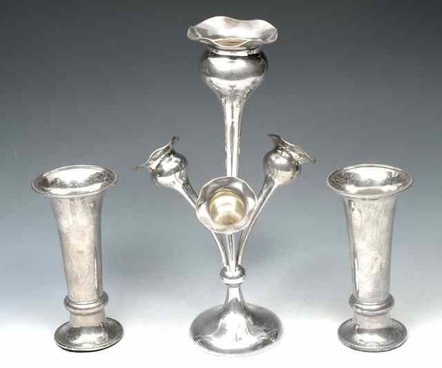 Appraisal: A SILVER POSY VASE with central stem and three further