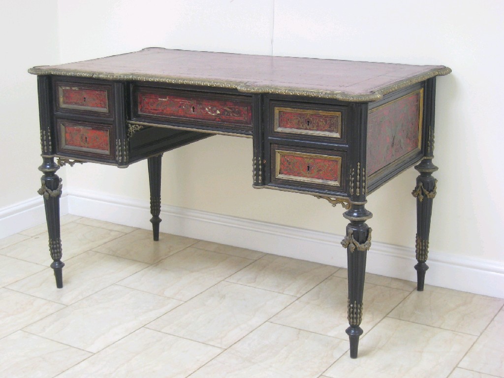 Appraisal: A th Century Boulle style Desk having leather top above