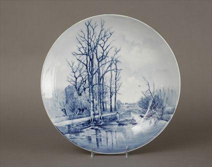 Appraisal: Delft-Style Blue and White Porcelain Charger with Canal Scene in