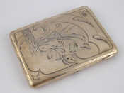 Appraisal: A Russian silver cigarette case engraved in the Art Nouveau