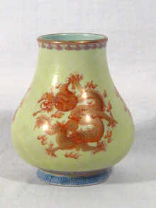 Appraisal: A small Chinese Hu shaped vase decorated with three gilded