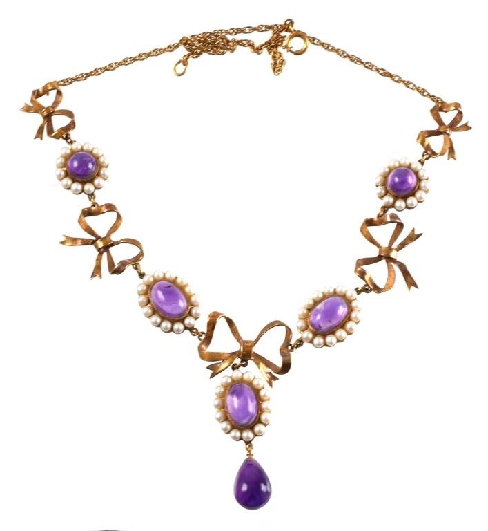 Appraisal: Necklace is set in K gold with cabochon and one