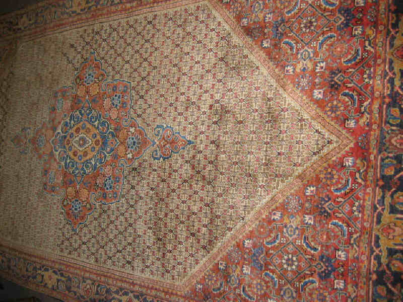 Appraisal: BIJAR AREA RUG The abrashed tan field of geometric design