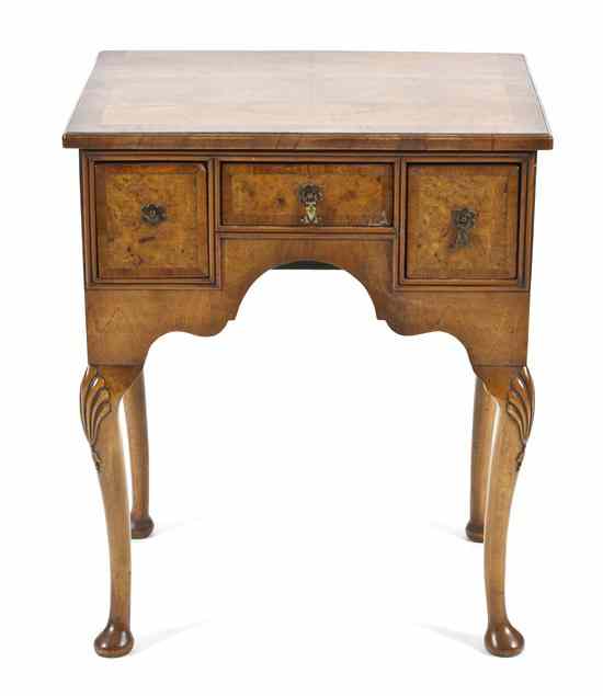 Appraisal: A George II Walnut Veneered Diminutive Writing Desk having a