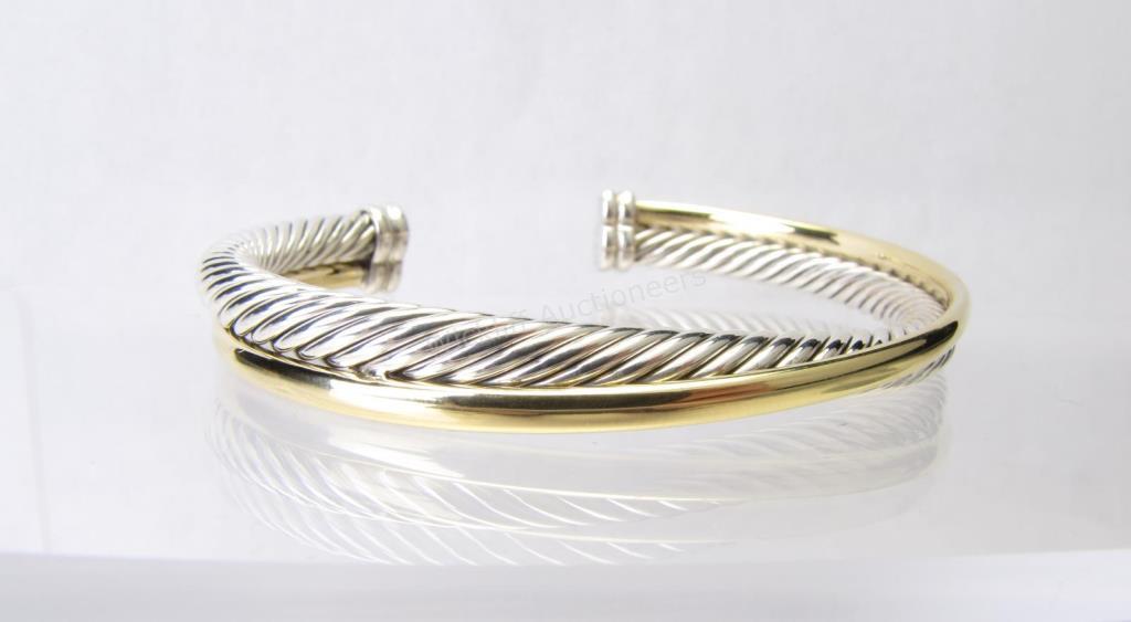 Appraisal: A David Yurman mm Crossover bracelet in K yellow gold