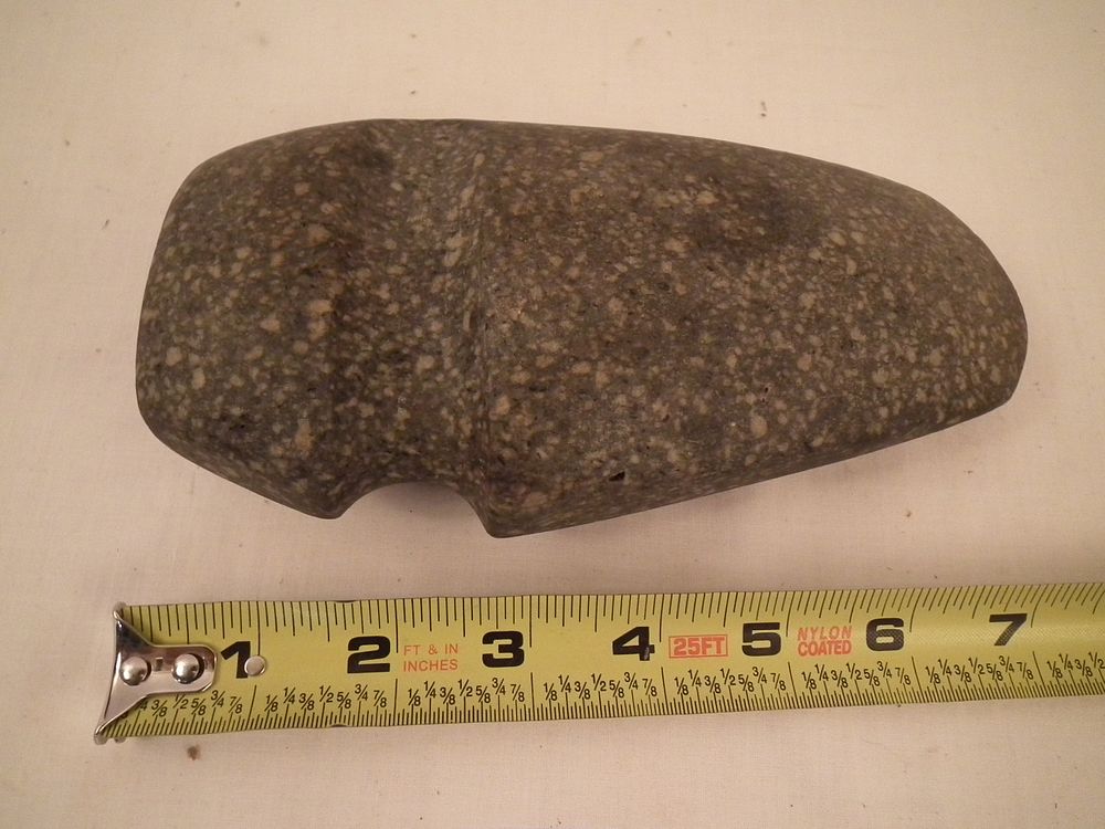 Appraisal: EARLY STONE INDIAN AXE HEAD Pre-Algonquin era speckled carved stone