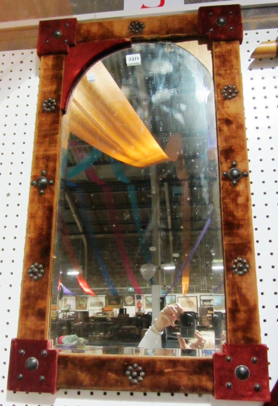 Appraisal: An arch top wall mirror with velvet frame together with