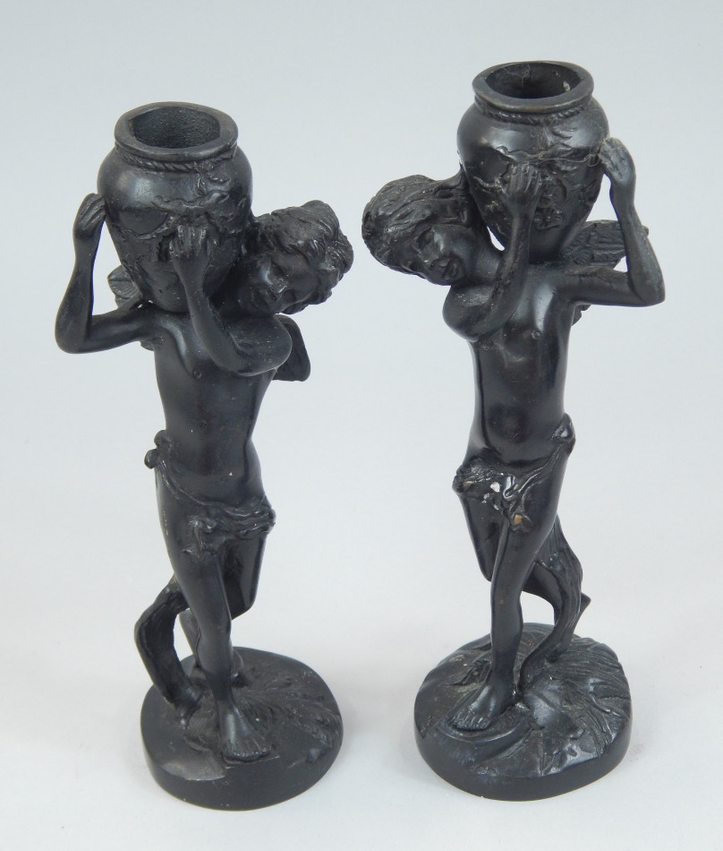 Appraisal: A pair of Grand Tour type bronzed figures each in