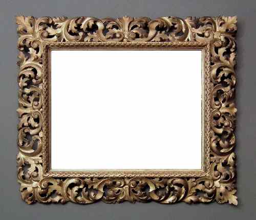 Appraisal: A th Century Florentine giltwood rectangular wall mirror with bold