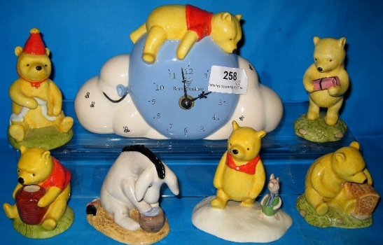 Appraisal: Royal Doulton Figures from Winnie The Pooh Collection Eeyores Birthday