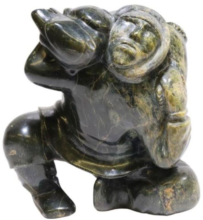 Appraisal: Inuit carved hardstone sculpture Man Wrestling Bear attributed to Qavaroak