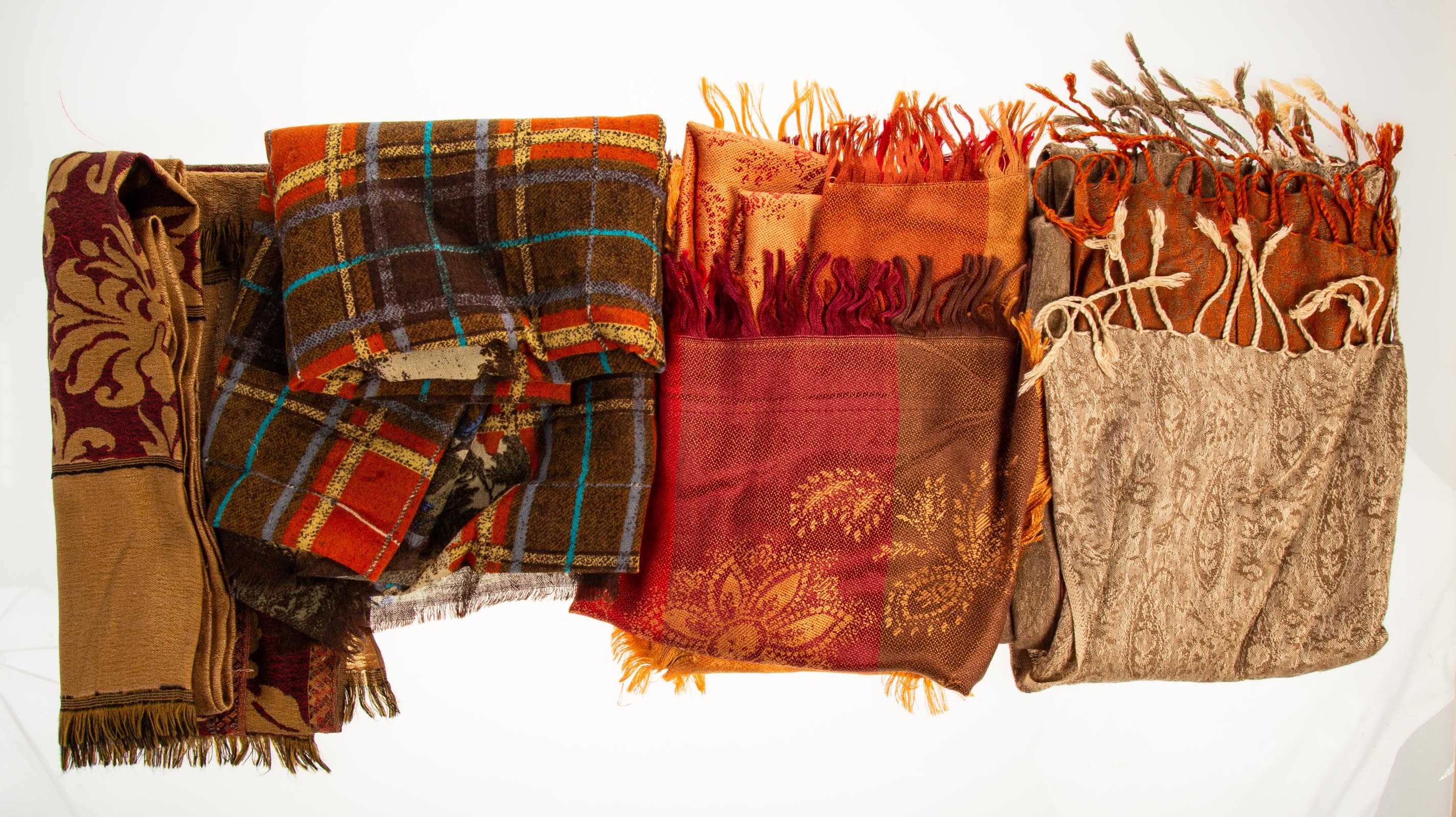 Appraisal: COLLECTION OF FALL HUE SCARVES Various sizes and materials