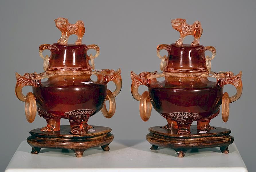 Appraisal: Two Chinese Carved Censers Two Chinese carved cherry amber censers