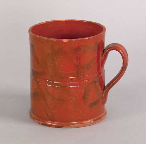 Appraisal: Redware mug th c with manganese swirl decoration h