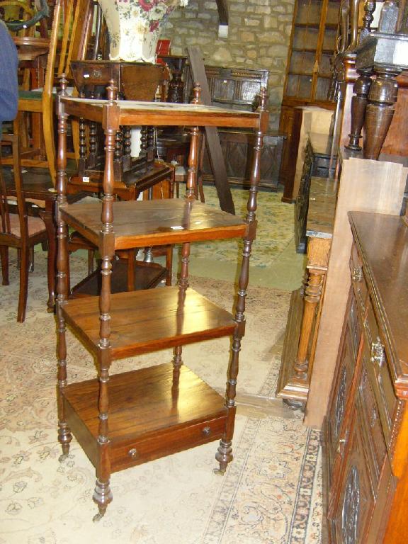 Appraisal: A Victorian rosewood -tier what-not fitted with a single frieze