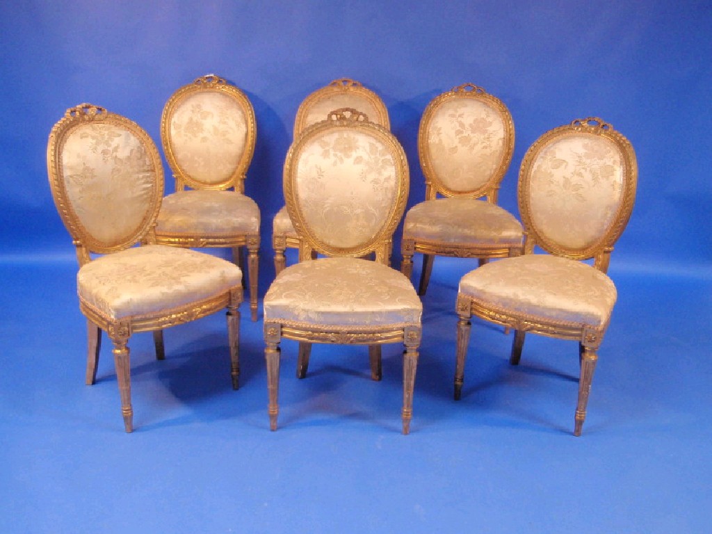 Appraisal: A set of six thC French gilt wood dining chairs