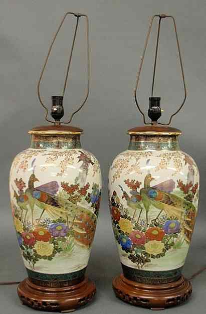 Appraisal: Large pair of Chinese style ceramic table lamps decorated with