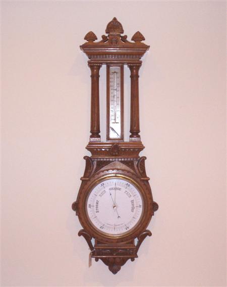 Appraisal: A large Victorian carved oak aneroid barometer of architectural form