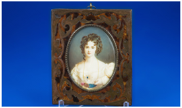 Appraisal: Portrait Miniature Showing A Young Woman Facing Straight Wearing A