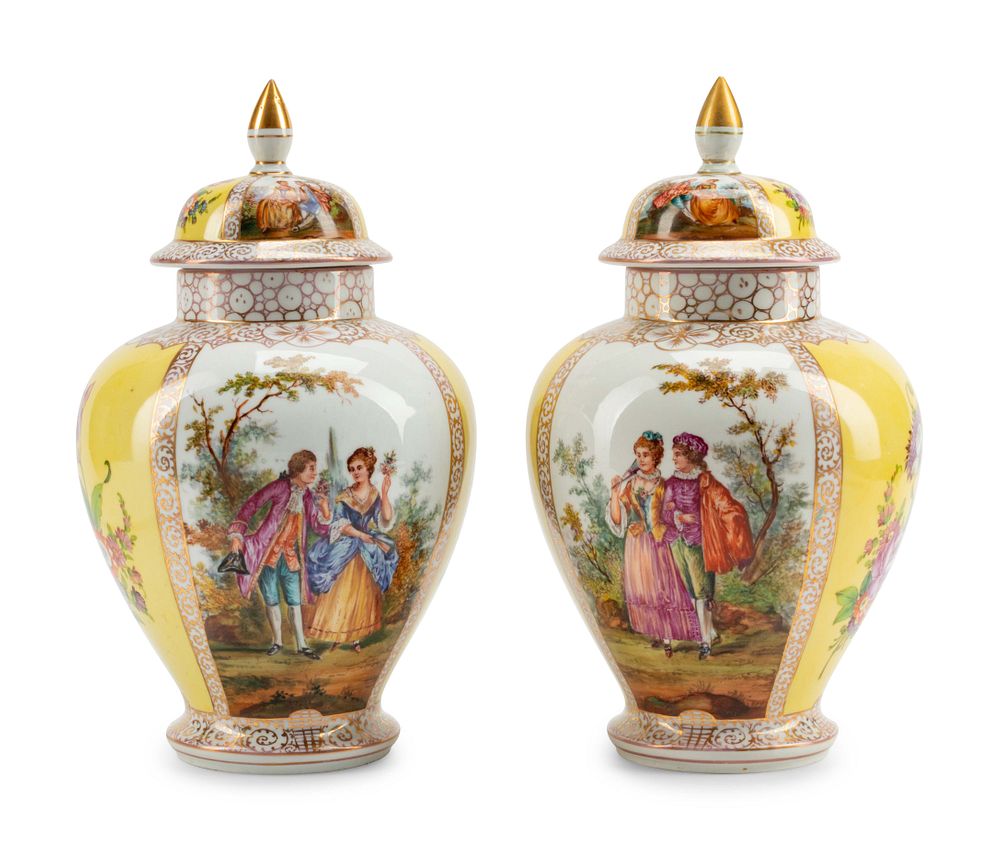 Appraisal: A Pair of Dresden Porcelain Covered Urns A Pair of