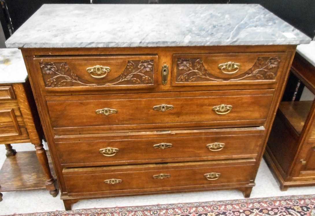 Appraisal: LATE VICTORIAN CARVED MAHOGANY CHEST OF DRAWERS Continental late th