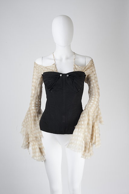 Appraisal: An Alexander McQueen sheer polka dot blouse with tie neckline