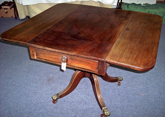 Appraisal: A Regency mahogany breakfast table fitted a drawer and raised