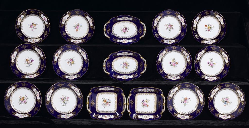 Appraisal: A COALPORT COBALT GROUND DESSERT SERVICE decorated with flower sprays